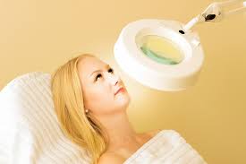 woman applying cosmetics